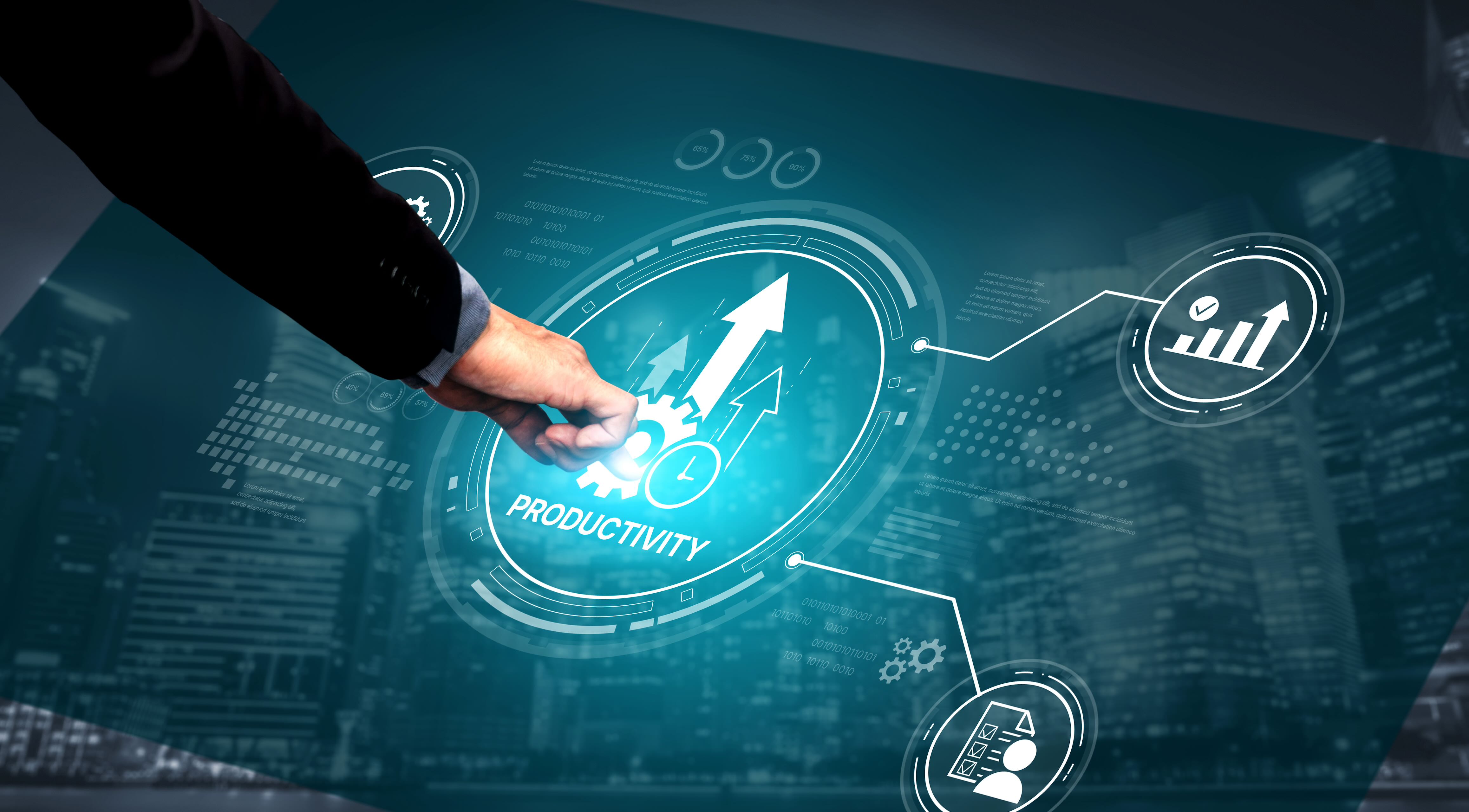 A person working touching a large screen showing productivity tool icons.